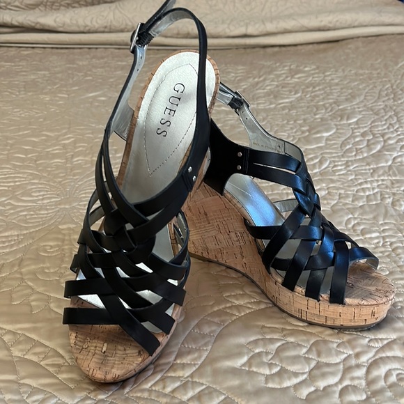 Guess Shoes - Guess black leather wedge sandals size 9.